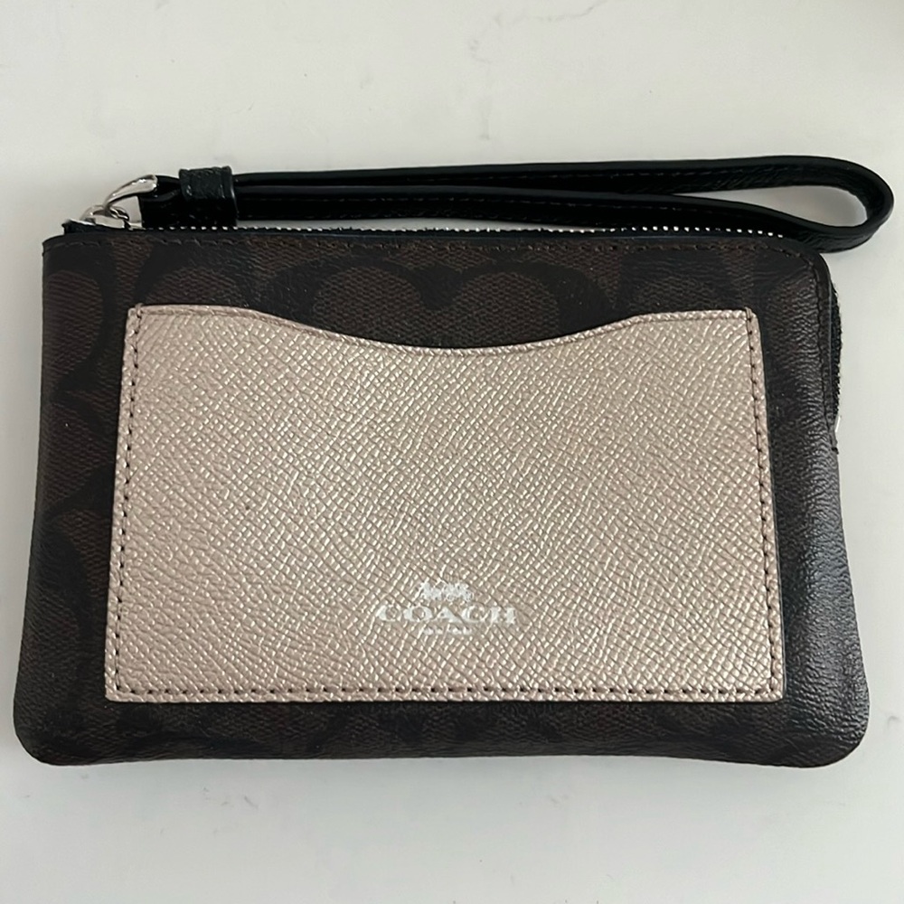 Clutch with wrist strap